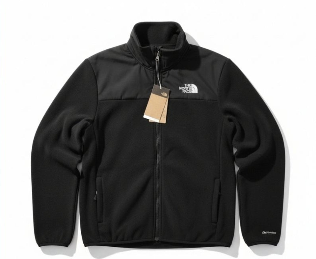 Veste polaire noire zippée de la marque The North Face